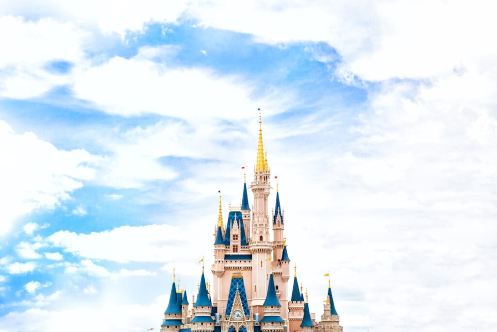 landscape photography of Walt Disney castle under cloudy sky